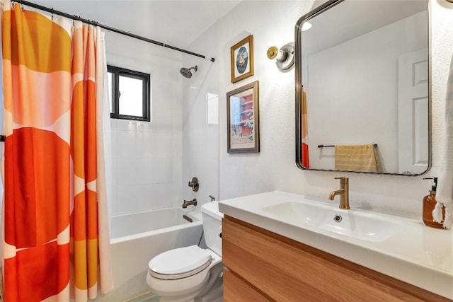 bathroom with vanity, shower / bath combination with curtain, and toilet