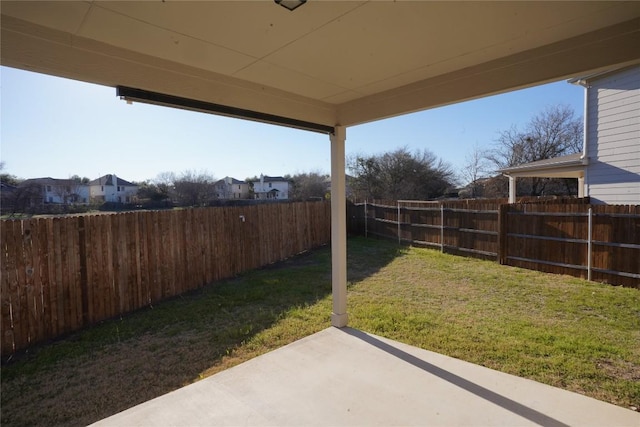 view of yard featuring a fenced backyard and a patio