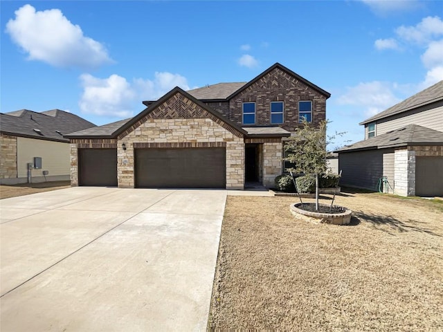 view of front of property featuring a garage and driveway