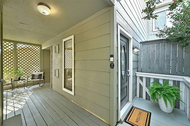 wooden deck featuring covered porch