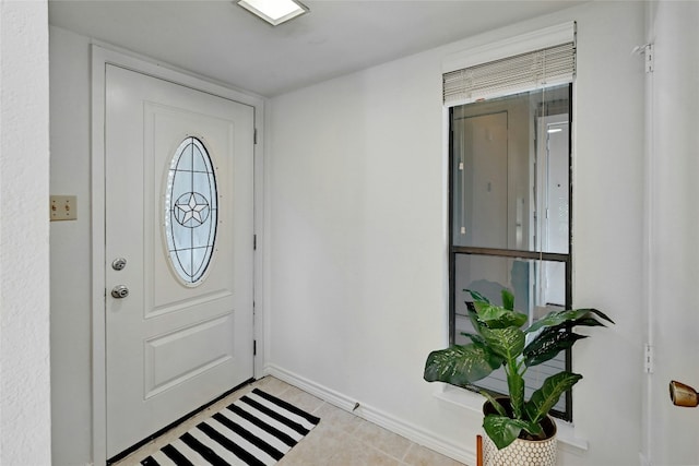8102 Baywood Dr Unit A, Austin, TX 78759 - entrance foyer featuring baseboards and light tile patterned floors