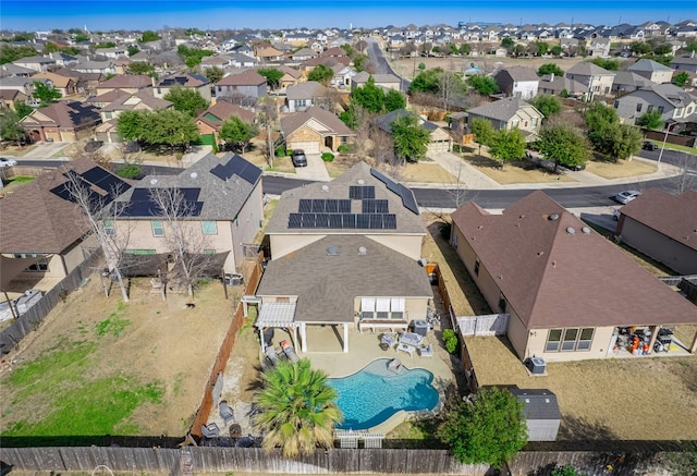 birds eye view of property with a residential view