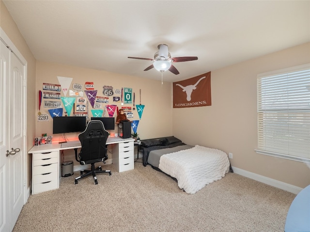 bedroom featuring carpet flooring, ceiling fan, and baseboards