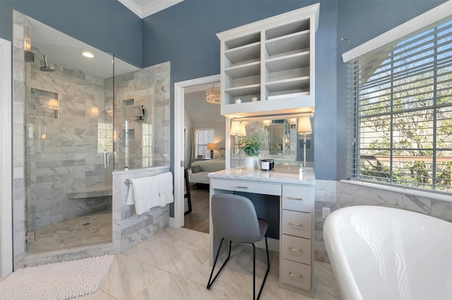 9288 Scenic Bluff Dr, Austin, TX 78733 - ensuite bathroom with a freestanding tub, a stall shower, crown molding, vanity, and marble finish flooring