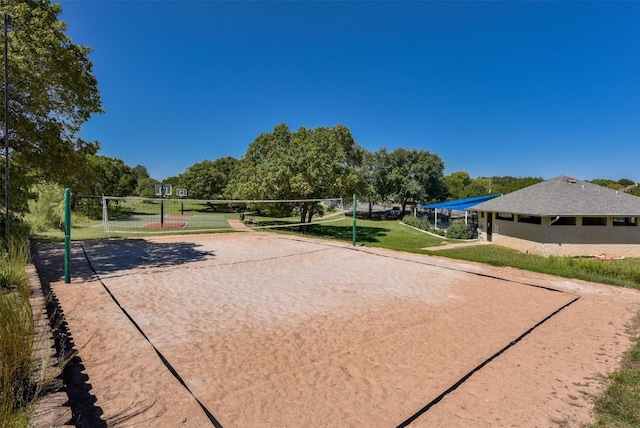 9288 Scenic Bluff Dr, Austin, TX 78733 - view of community featuring volleyball court, dirt driveway, and a yard