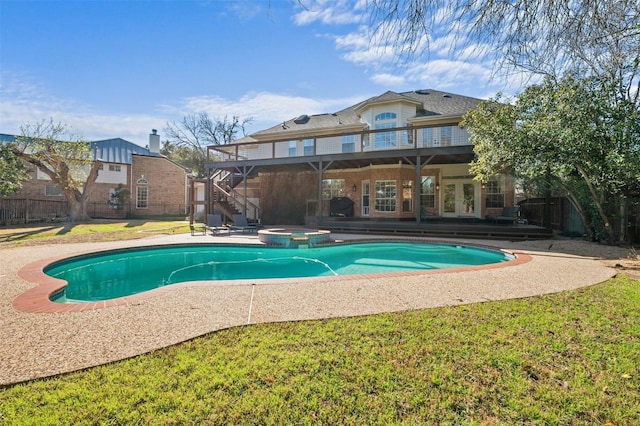 9288 Scenic Bluff Dr, Austin, TX 78733 - view of pool with stairway, a patio, french doors, a pool with connected hot tub, and a yard
