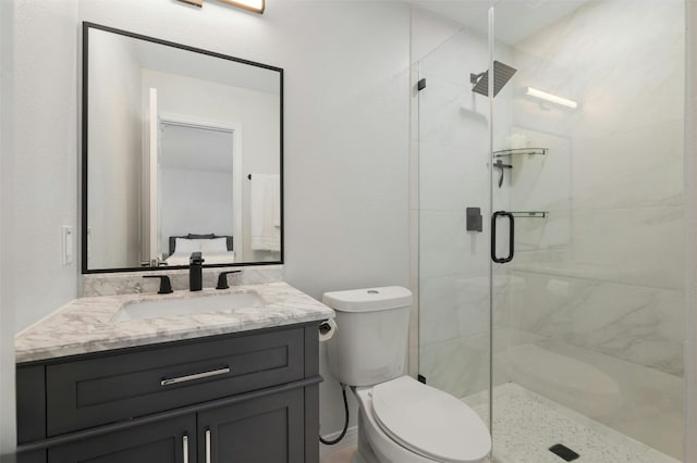 9288 Scenic Bluff Dr, Austin, TX 78733 - bathroom with toilet, a stall shower, and vanity