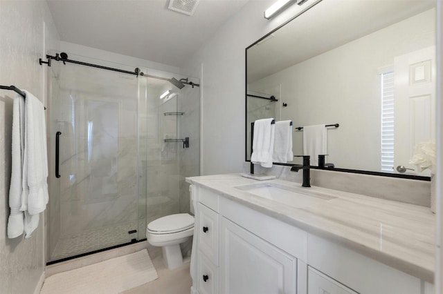 9288 Scenic Bluff Dr, Austin, TX 78733 - full bath with vanity, a shower stall, and toilet