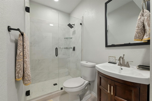 9288 Scenic Bluff Dr, Austin, TX 78733 - full bath featuring vanity, toilet, a shower stall, and a textured wall
