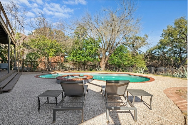 9288 Scenic Bluff Dr, Austin, TX 78733 - view of pool with a fenced backyard, a jacuzzi, a deck, and a patio area