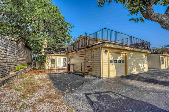 exterior space featuring an attached garage