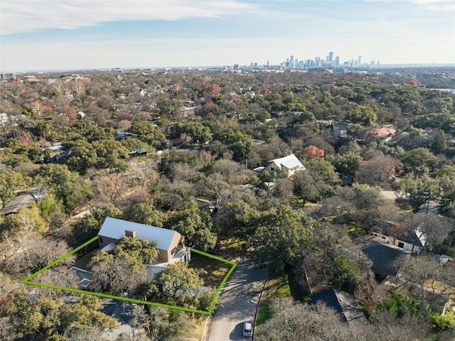 birds eye view of property with a city view