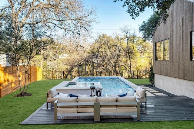 view of pool featuring a fenced backyard, a deck, an outdoor hangout area, and a lawn