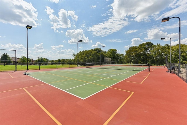 view of sport court with community basketball court and fence