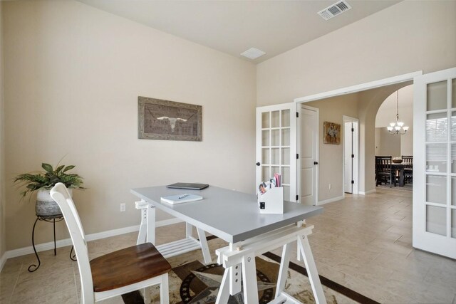 dining space featuring visible vents, light tile patterned flooring, french doors, arched walkways, and a notable chandelier