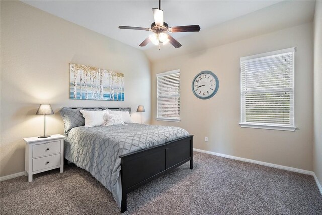 bedroom with baseboards, ceiling fan, and carpet