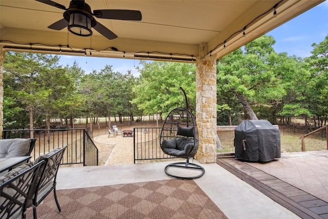 view of patio featuring ceiling fan and grilling area