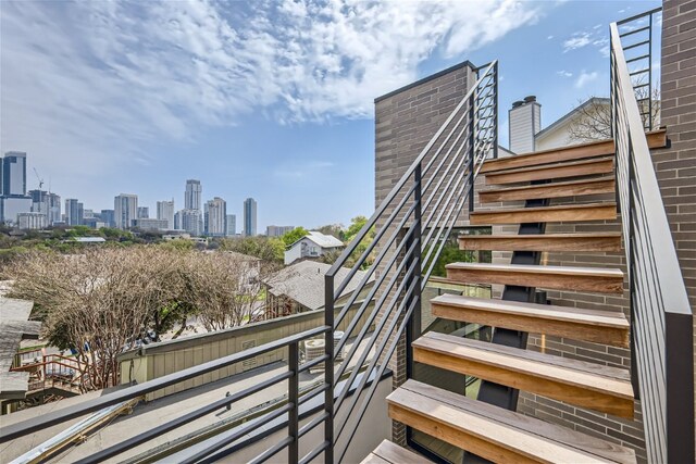 stairs featuring a view of city