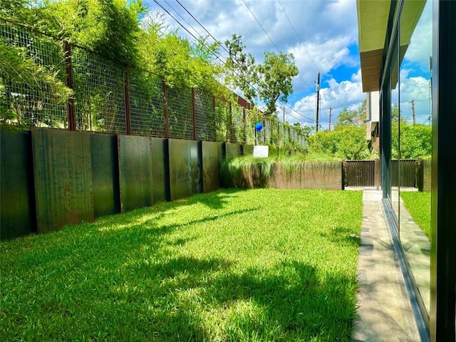 view of yard featuring fence