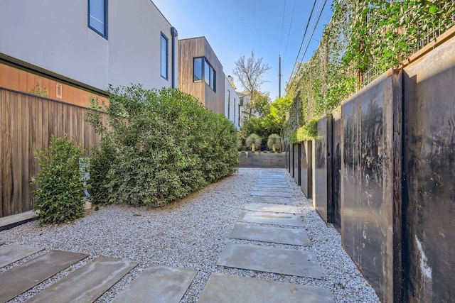 exterior space with a fenced backyard