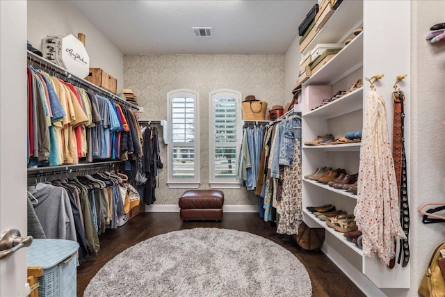 spacious closet with visible vents and wood finished floors