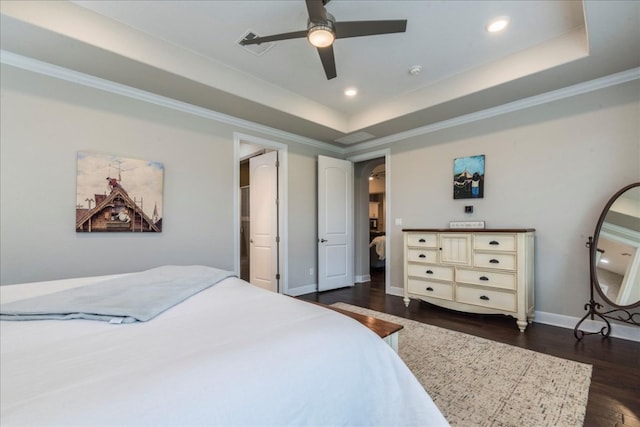 bedroom with baseboards, a raised ceiling, ornamental molding, dark wood-type flooring, and recessed lighting