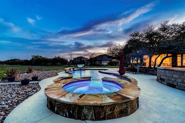 view of pool featuring a pool with connected hot tub