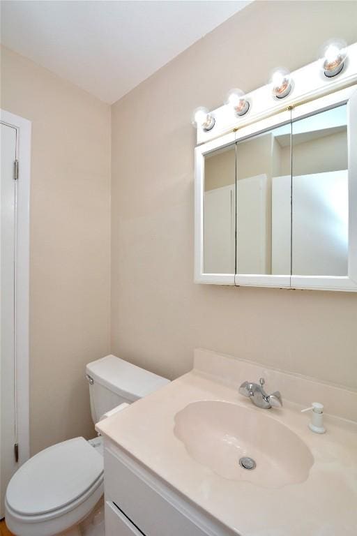 half bath with toilet and vanity