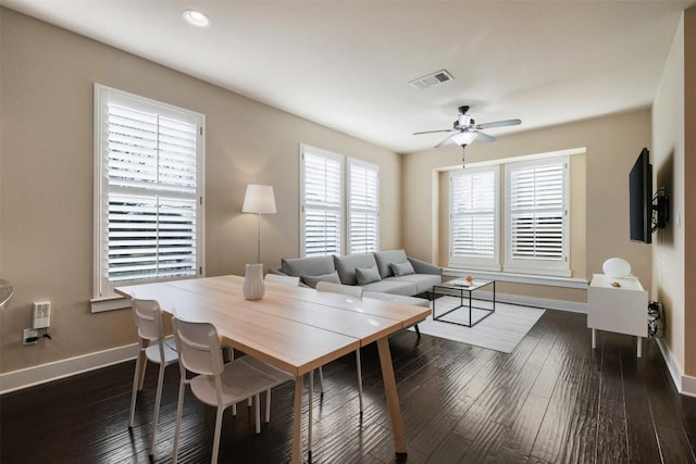 dining room with baseboards, visible vents, a ceiling fan, dark wood-type flooring, and recessed lighting