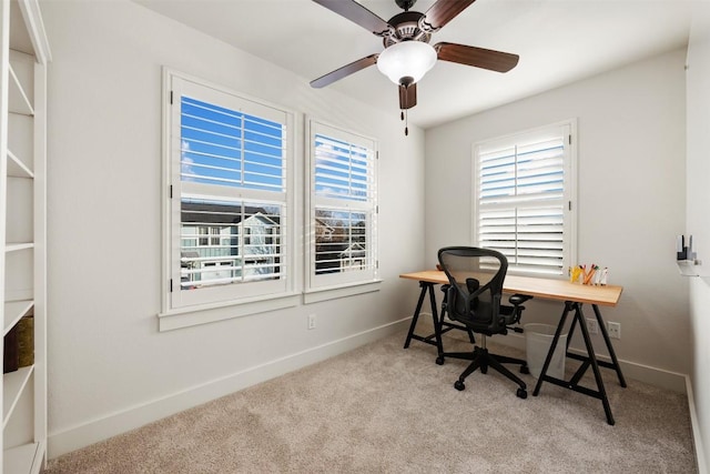 office area featuring carpet floors and baseboards