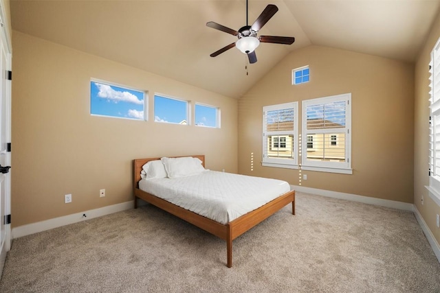 carpeted bedroom with a ceiling fan, lofted ceiling, and baseboards