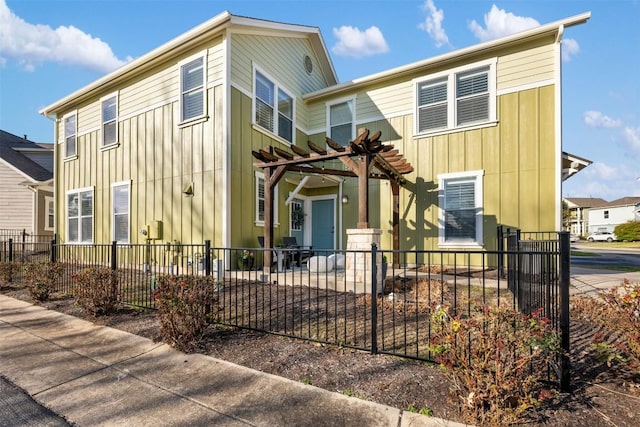 12304 Barras Branch Dr, Austin, TX 78748 - multi unit property with a pergola, fence private yard, and board and batten siding