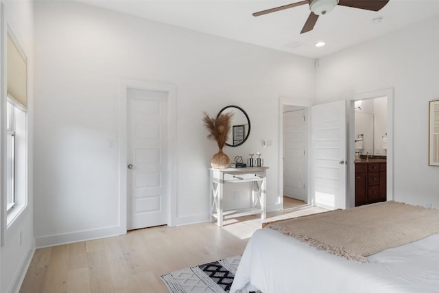 bedroom with connected bathroom, recessed lighting, a ceiling fan, baseboards, and light wood-style floors