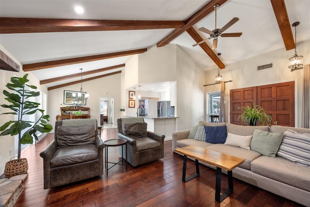 living room featuring high vaulted ceiling, visible vents, dark wood-style flooring, and beamed ceiling