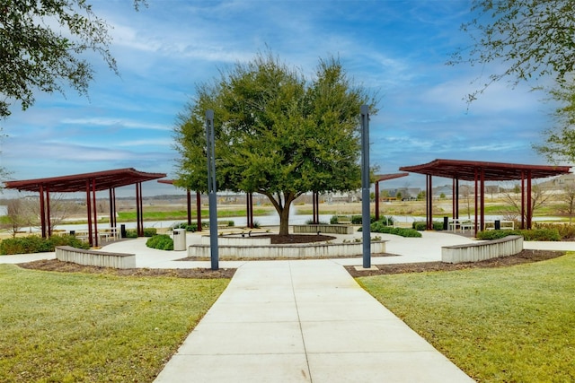 view of home's community with a yard and a gazebo