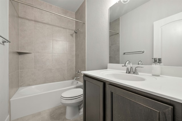 full bathroom featuring bathing tub / shower combination, toilet, and vanity