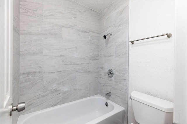 full bathroom featuring toilet and  shower combination