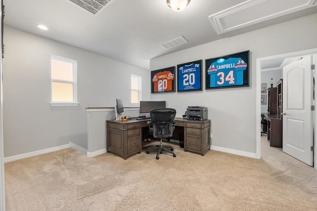 office with carpet floors, baseboards, visible vents, and attic access