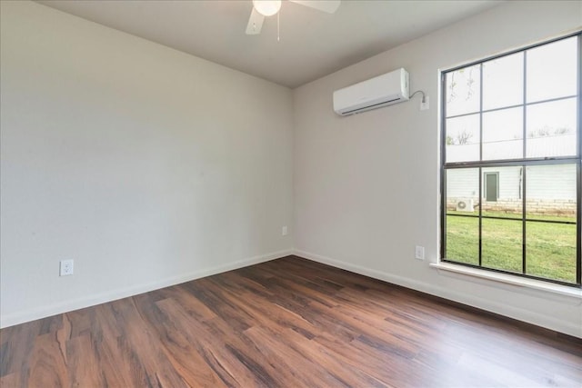 empty room with ceiling fan, baseboards, dark wood finished floors, and an AC wall unit