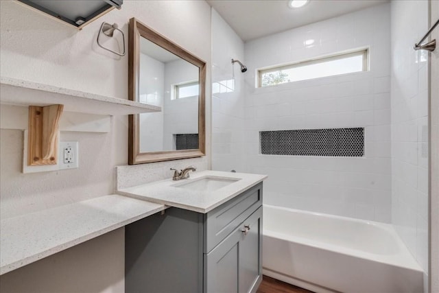 full bathroom with tub / shower combination and vanity