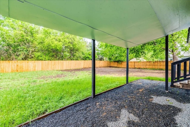 view of yard with a fenced backyard and a patio