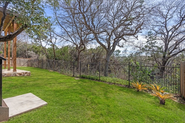 view of yard with a fenced backyard