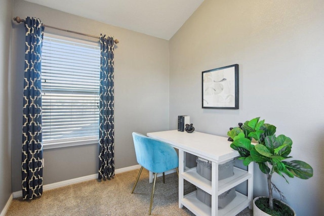 home office with carpet, baseboards, and vaulted ceiling