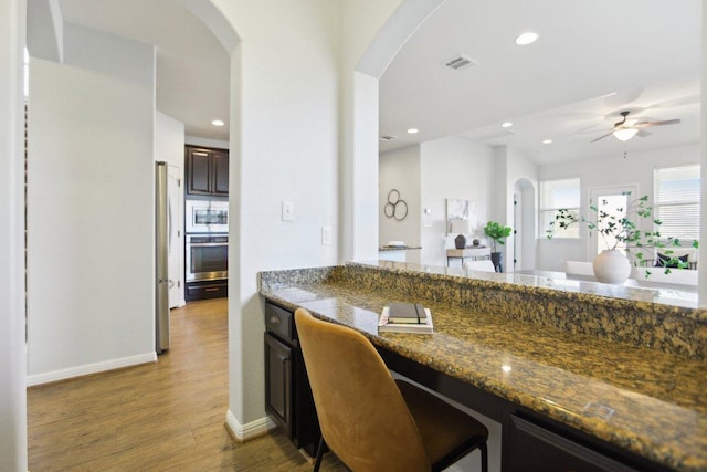 kitchen featuring light wood finished floors, visible vents, appliances with stainless steel finishes, and recessed lighting