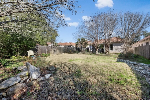 view of yard featuring a fenced backyard