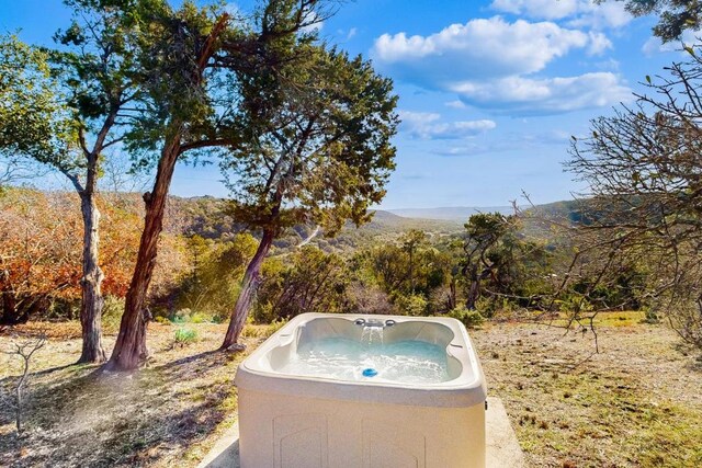 961 Buttercup Ln, Wimberley, TX 78676 - view of yard with a hot tub and a mountain view