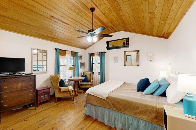 961 Buttercup Ln, Wimberley, TX 78676 - bedroom featuring wood ceiling, light wood finished floors, vaulted ceiling, and ceiling fan