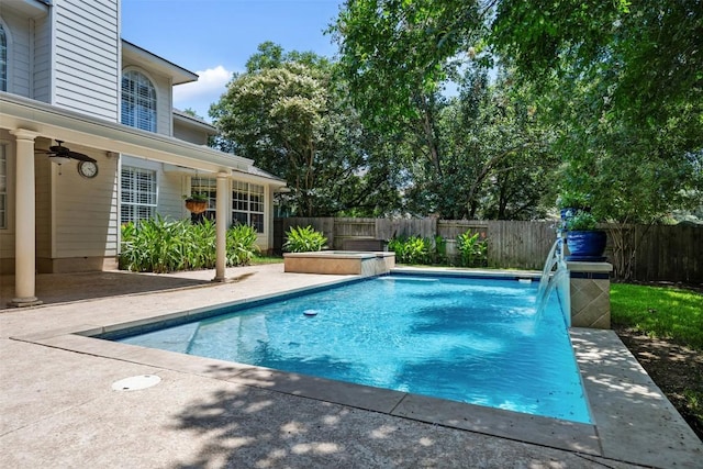 view of swimming pool with a patio, a fenced backyard, a ceiling fan, and a fenced in pool