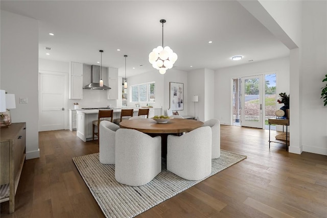 12120 Fitzhugh Pl, Dripping Springs, TX 78620 - dining space featuring recessed lighting, dark wood-type flooring, a chandelier, and baseboards