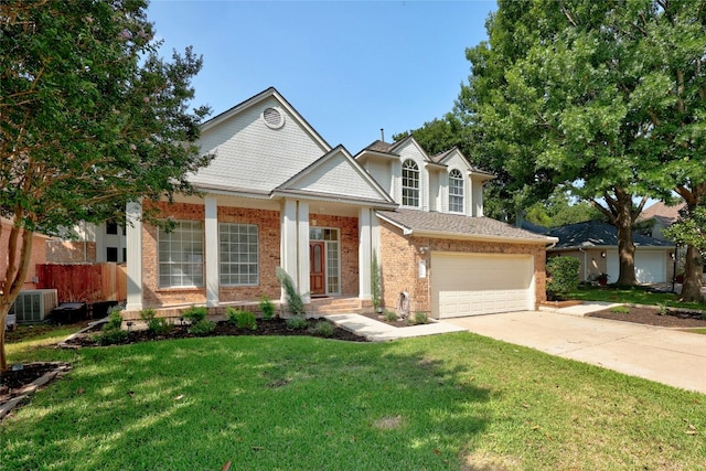 view of front of house featuring a garage, concrete driveway, cooling unit, a front lawn, and brick siding